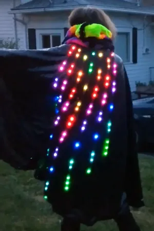 Knee length black sequin cape with led animations down the back