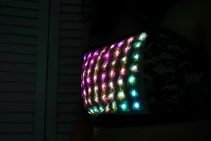 crop top with textured smocking over colorful LEDs